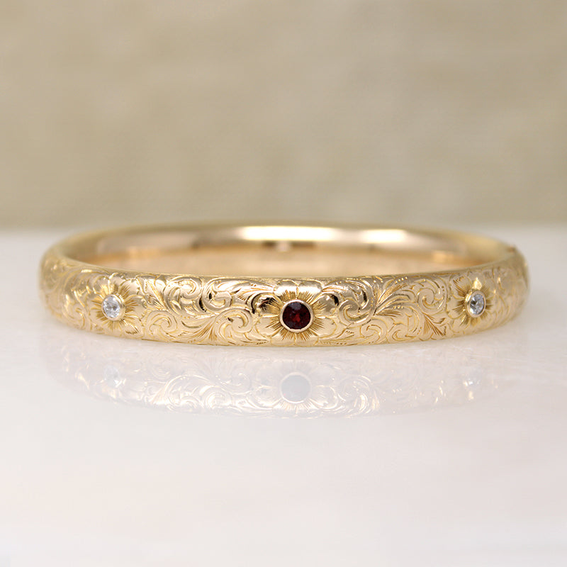 May's Gem Set Engraved Gold Bangle