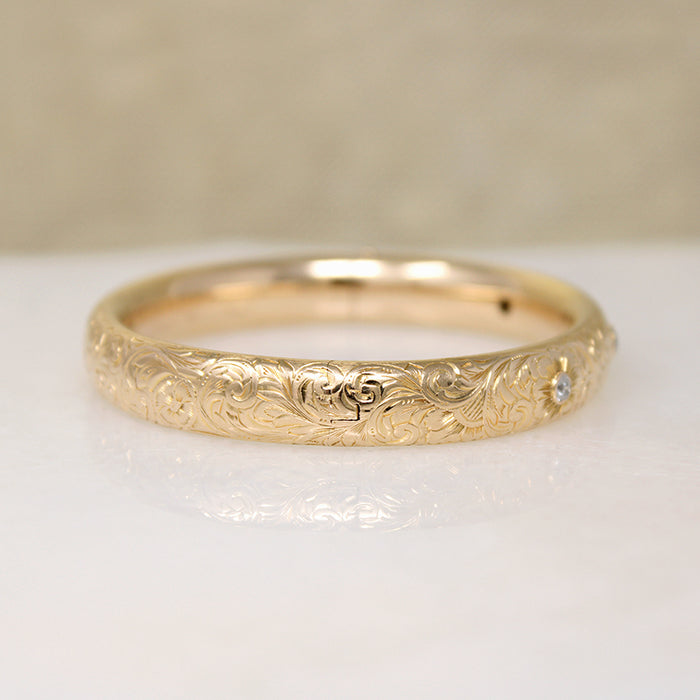 May's Gem Set Engraved Gold Bangle
