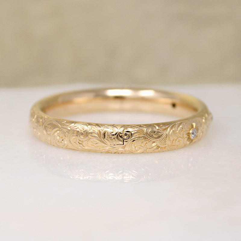 May's Gem Set Engraved Gold Bangle