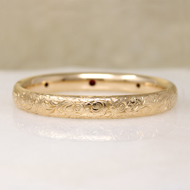 May's Gem Set Engraved Gold Bangle