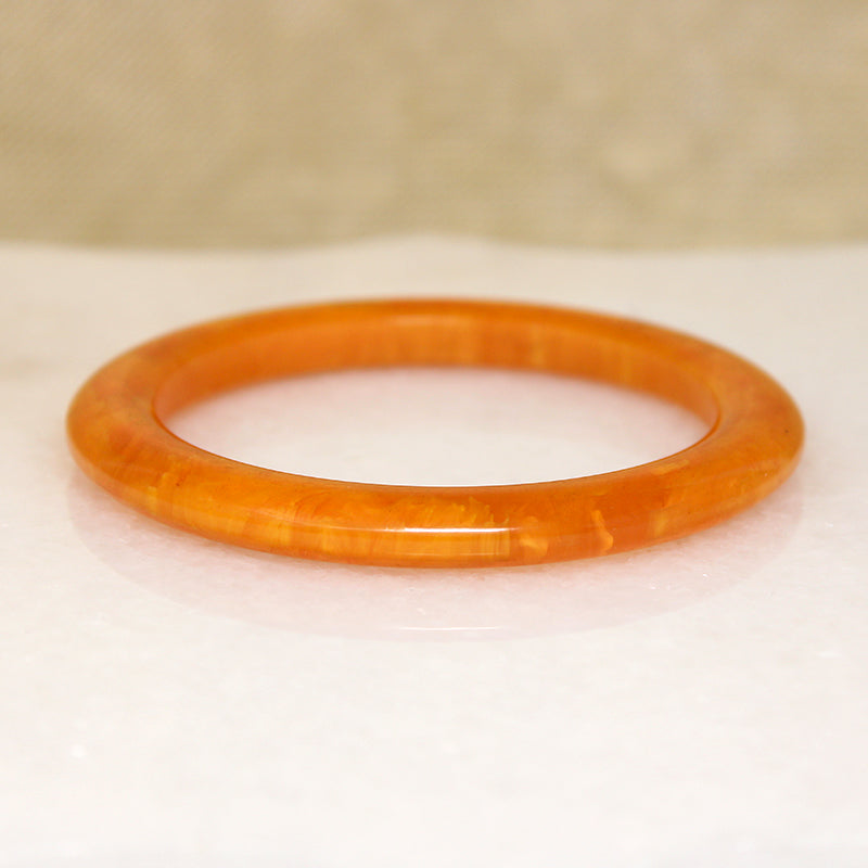 Marmalade-Colored Plastic Bangle Bracelet
