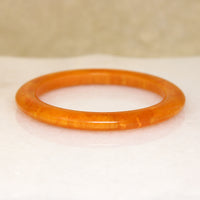 Marmalade-Colored Plastic Bangle Bracelet