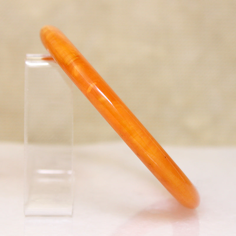 Marmalade-Colored Plastic Bangle Bracelet