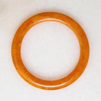 Marmalade-Colored Plastic Bangle Bracelet