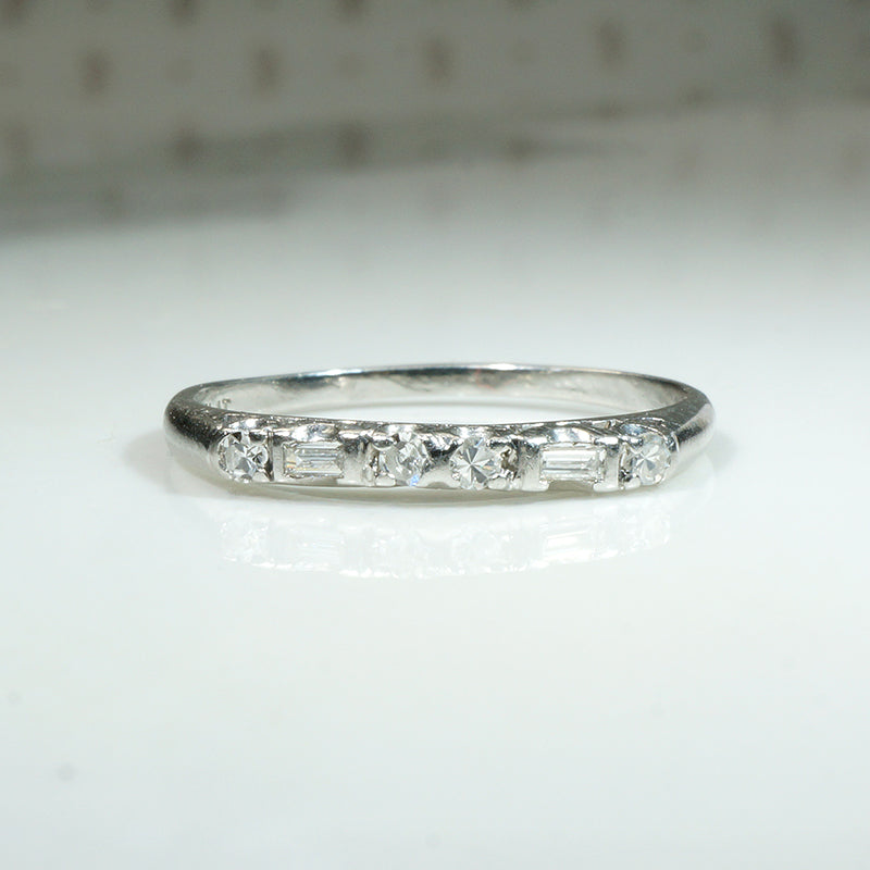 Elevated Baguette & Round Diamond Platinum Band