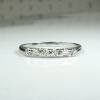 Elevated Baguette & Round Diamond Platinum Band