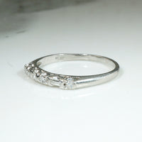 Elevated Baguette & Round Diamond Platinum Band