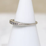 Dainty Channel Set Graduated Diamond Band in White Gold