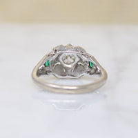 Fresh Floral Art Deco Diamond Ring with Emerald Accents