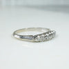 Retro White Gold Band with Seven Bright Diamonds