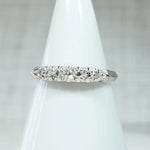 Retro White Gold Band with Seven Bright Diamonds