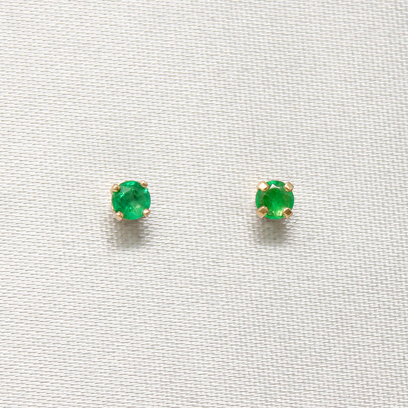 Radiant Emeralds in Gold Stud Earrings