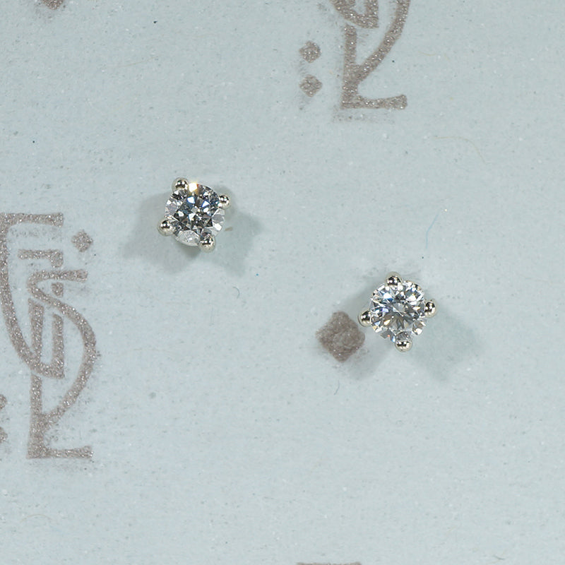 Tiny Diamonds in 14k White Gold Stud Earrings