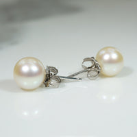 Glossy White 7mm Pearls in 14k White Gold Studs