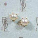 Creamy Pearls in Distinctive Gold Stud Earrings