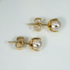 Creamy Pearls in Distinctive Gold Stud Earrings