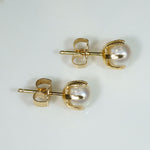 Creamy Pearls in Distinctive Gold Stud Earrings
