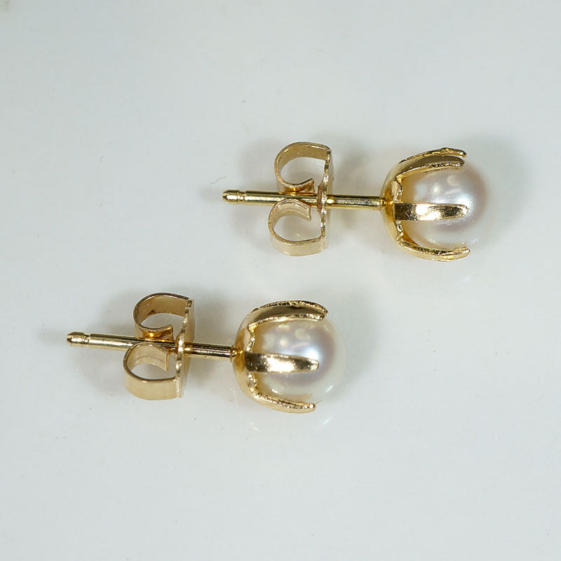 Creamy Pearls in Distinctive Gold Stud Earrings