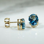 Brilliant Blue Topaz in Gold Stud Earrings