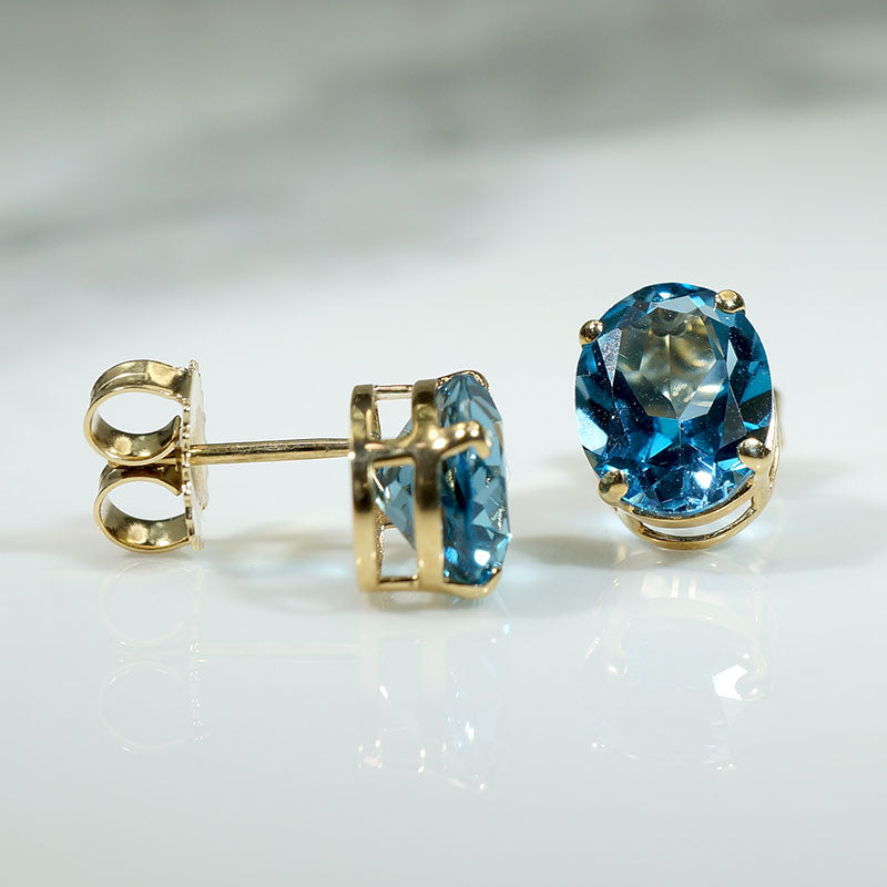 Brilliant Blue Topaz in Gold Stud Earrings