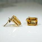 Golden Emerald Cut Citrine in Gold Stud Earrings