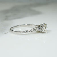 Architectural Art Deco Diamond Solitaire in Engraved White Gold