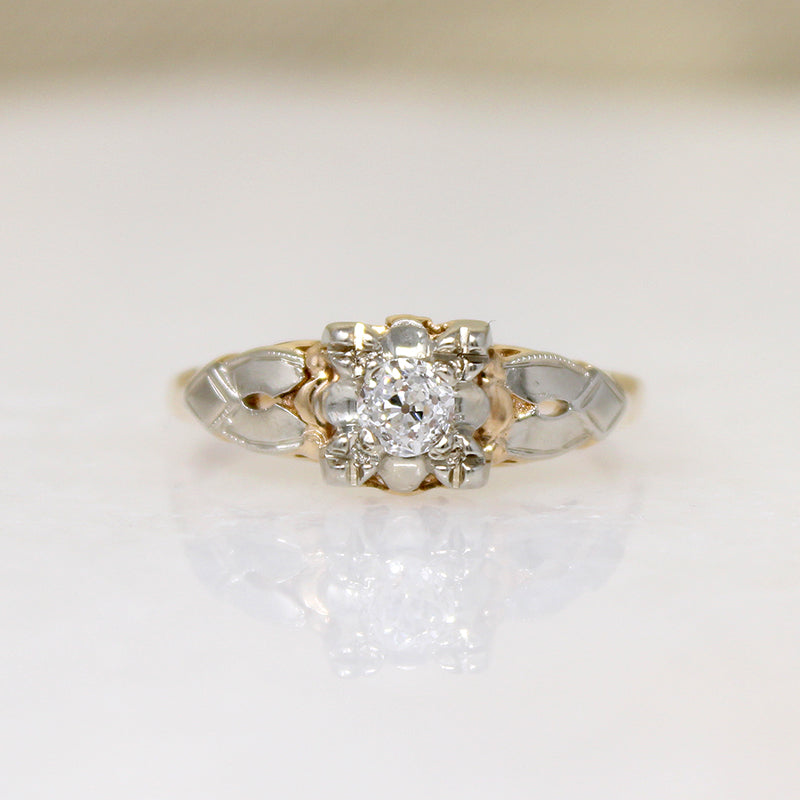 Charming Two-Tone Gold & Diamond Solitaire Ring