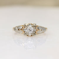Charming Two-Tone Gold & Diamond Solitaire Ring
