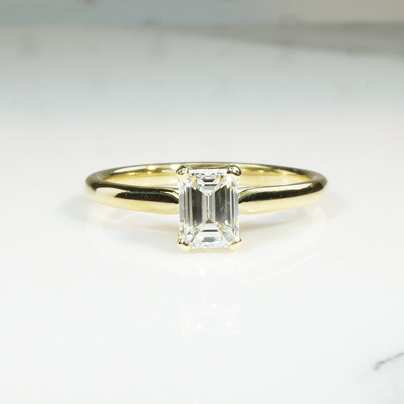 Lovely 18k Yellow Gold Emerald Cut Diamond Solitaire