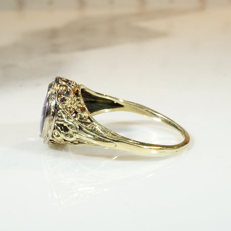 Brilliant Buff Top Cut Amethyst in Gold Filigree Solitaire