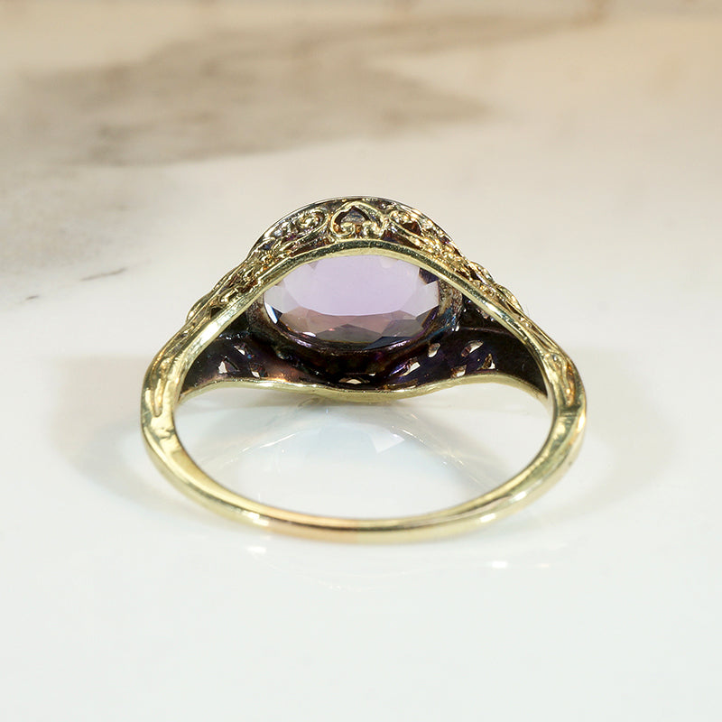 Brilliant Buff Top Cut Amethyst in Gold Filigree Solitaire