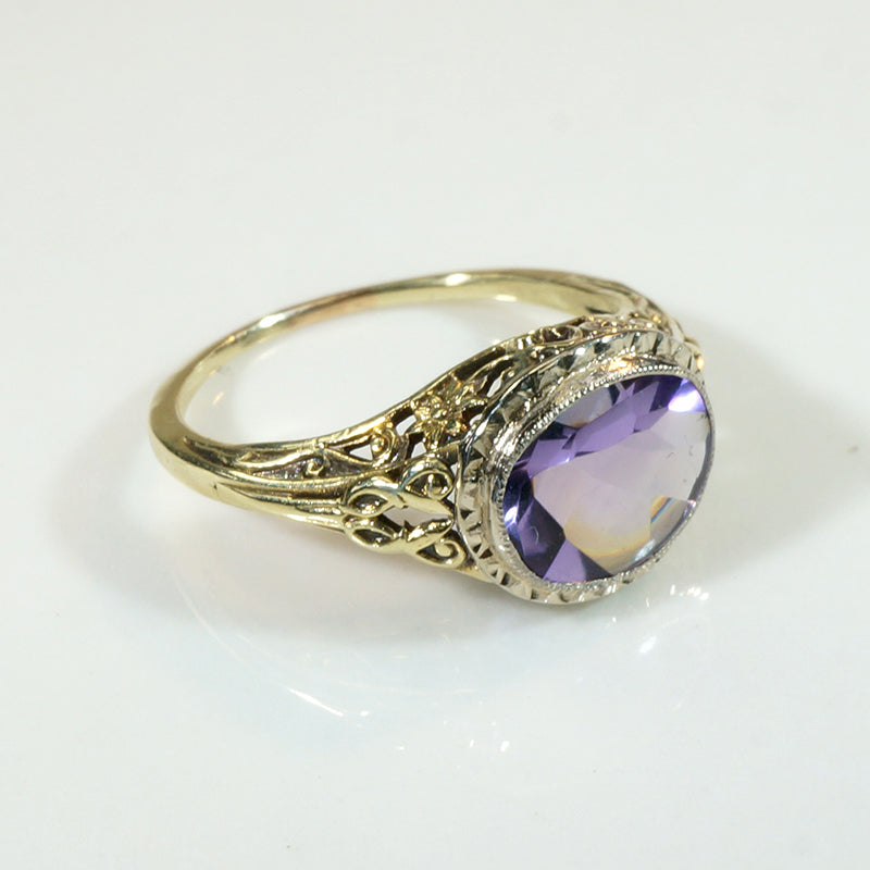 Brilliant Buff Top Cut Amethyst in Gold Filigree Solitaire