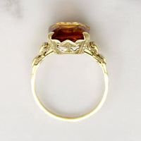 Charming Citrine Ring with Buckle Motif