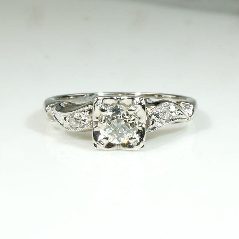 Classic Diamond & White Gold Ring with Jaunty Wave
