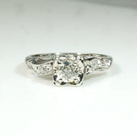 Classic Diamond & White Gold Ring with Jaunty Wave