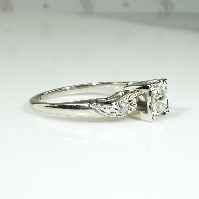 Classic Diamond & White Gold Ring with Jaunty Wave