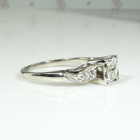 Classic Diamond & White Gold Ring with Jaunty Wave