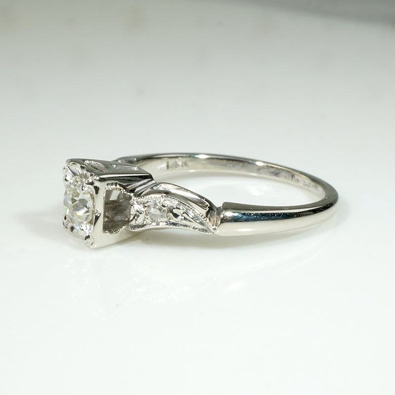 Classic Diamond & White Gold Ring with Jaunty Wave