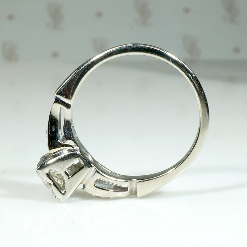 Classic Diamond & White Gold Ring with Jaunty Wave