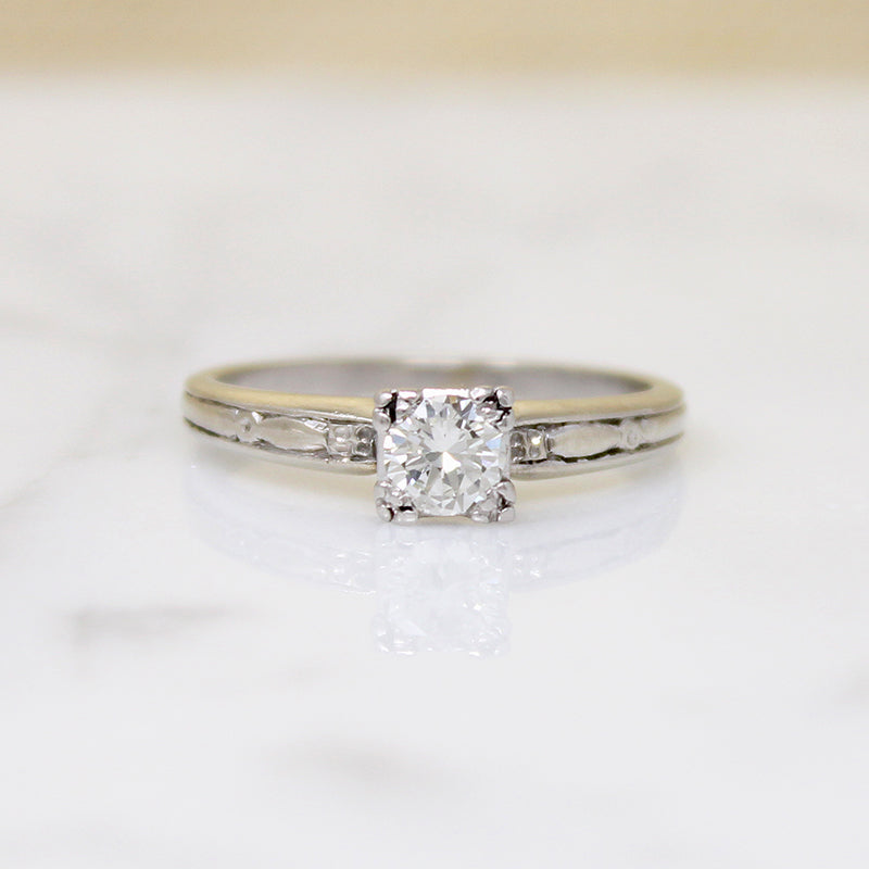 Diamond Solitaire Ring with Graceful Details