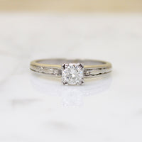 Diamond Solitaire Ring with Graceful Details