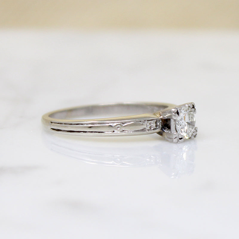 Diamond Solitaire Ring with Graceful Details