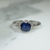 Fleur-de-Lis Art Deco Sapphire Solitaire Ring