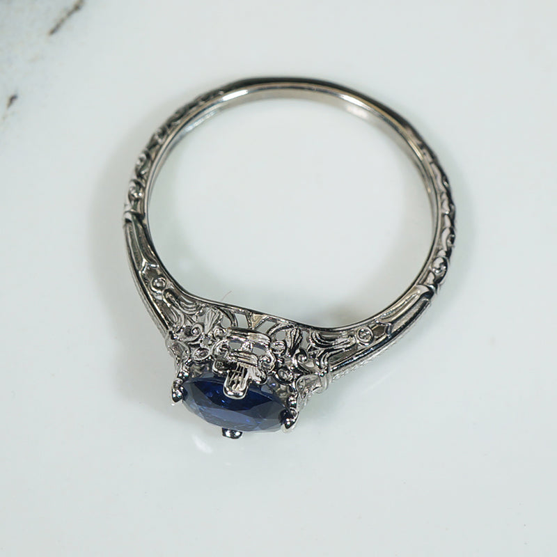 Fleur-de-Lis Art Deco Sapphire Solitaire Ring