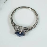 Fleur-de-Lis Art Deco Sapphire Solitaire Ring