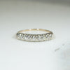 Slender Two-Tone Seven Diamond Wedding Band