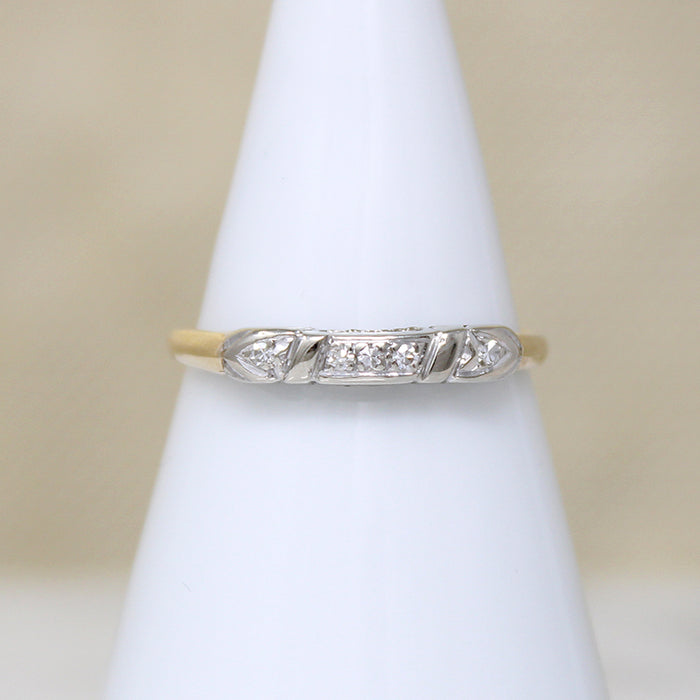 Five Pretty Diamonds in Two-Tone Gold Wedding Band