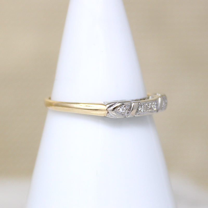 Five Pretty Diamonds in Two-Tone Gold Wedding Band