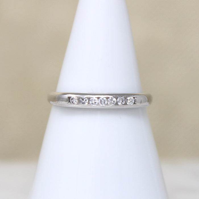 Seven Diamonds Channel Set in Slim Palladium Band