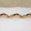 "X" Link Bracelet with Red & White Baguettes by Trifari
